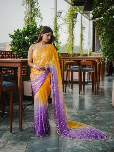 women wearing a Pink Satin Silk Party Wear Saree available online
